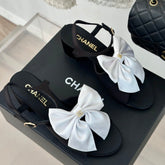 Double CC Big Bow High Sandal Sheepskin Black White